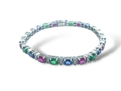 Bracciale con diamanti, rubini, zaffiri e tsavorite usato garantito
