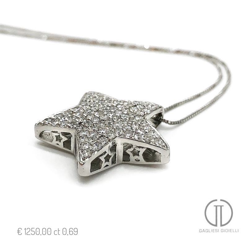 Collana oro bianco pendente a stella di diamanti