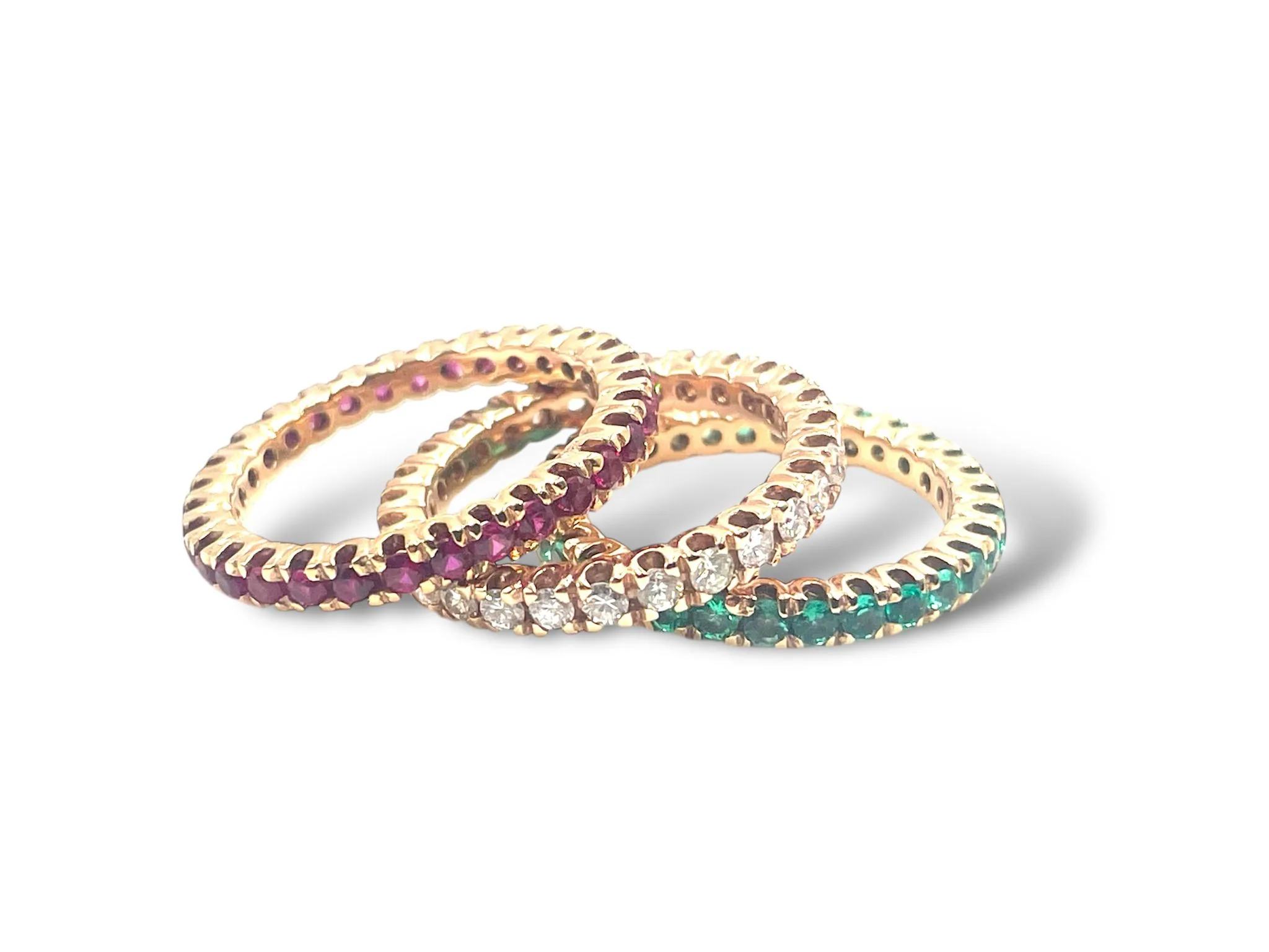 Anelli eternity smeraldi, rubini e diamanti